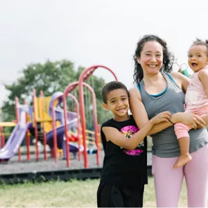 woman with kids at playground