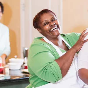 Group of women cooking healthy food