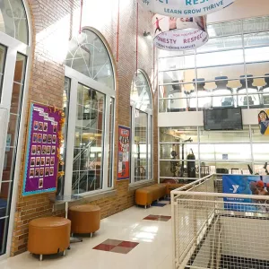 Lobby of Ridgewood YMCA with view of staircase and strength training room