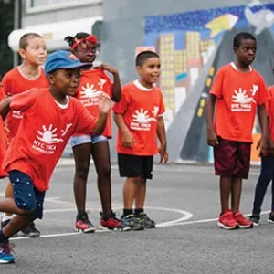 Boy running at summer camp