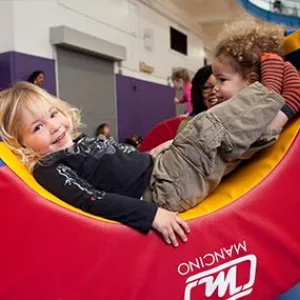 Toddlers playing in YMCA gym